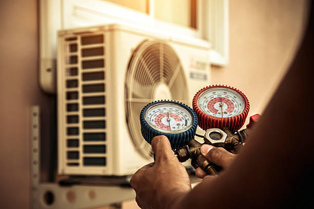 Professional Air Conditioning Service technician working in Delanson, NY